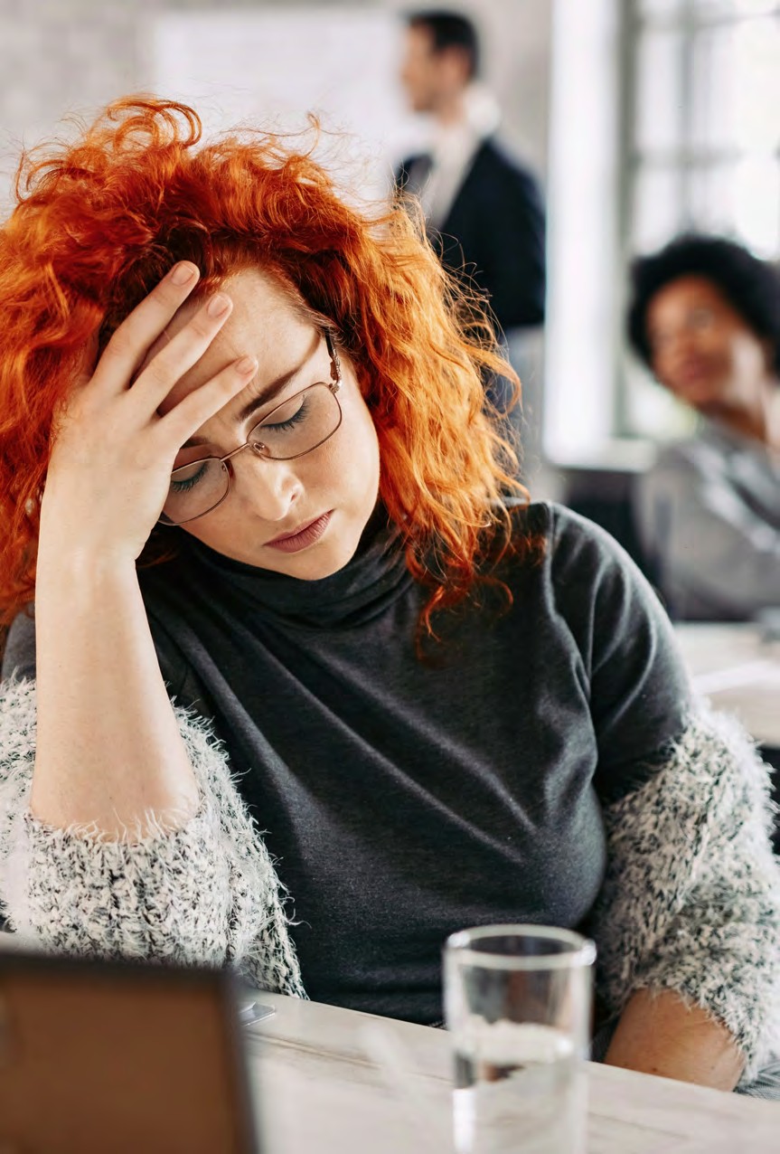 Frustrated employee dealing with disconnected systems